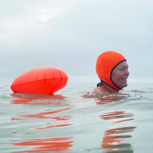 a woman using a tow float
