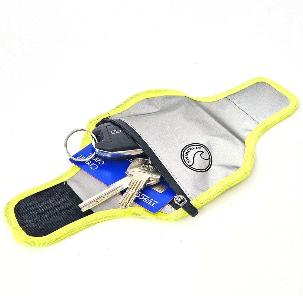 Reflective wrist wallet for keys and card