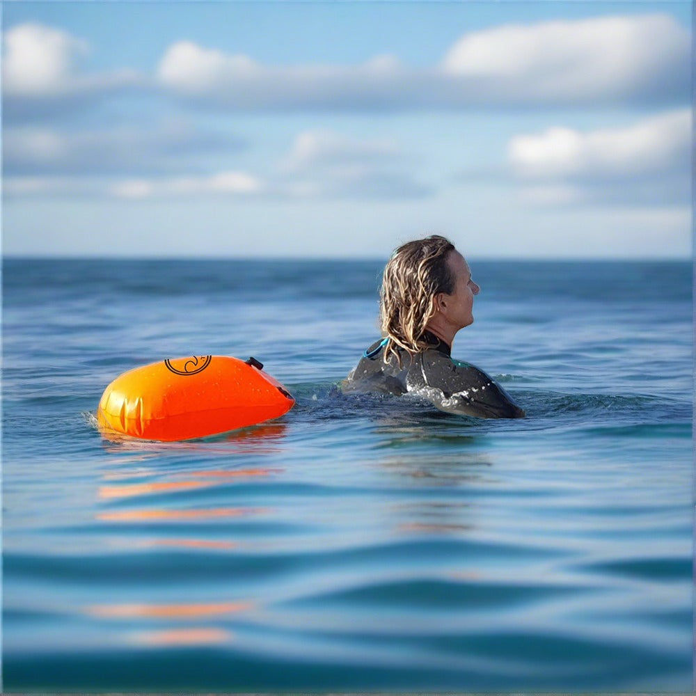 SwimCell Tow Float in sea wild swimming